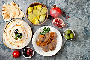 Middle Eastern traditional dinner. Authentic arab cuisine. Meze party food. Top view, flat lay, overhead.