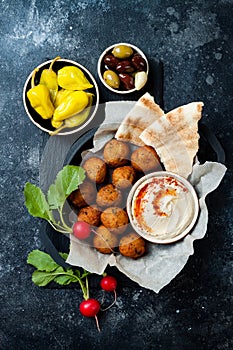 Middle Eastern traditional dinner. Authentic arab cuisine. Meze party food. Top view, flat lay, overhead.