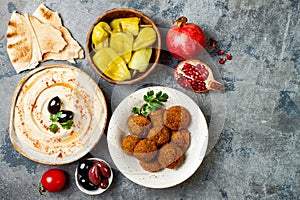 Middle Eastern traditional dinner. Authentic arab cuisine. Meze party food. Top view, flat lay, overhead.