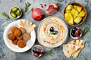 Middle Eastern traditional dinner. Authentic arab cuisine. Meze party food. Top view, flat lay, overhead. photo