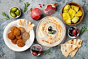 Middle Eastern traditional dinner. Authentic arab cuisine. Meze party food. Top view, flat lay, overhead.