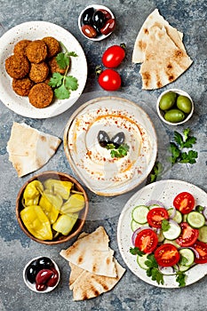 Middle Eastern traditional dinner. Authentic arab cuisine. Meze party food. Top view, flat lay, overhead.