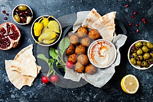 Middle Eastern traditional dinner. Authentic arab cuisine. Meze party food. Top view, flat lay, overhead.