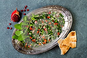 Middle Eastern traditional salad Tabbouleh. Authentic arab cuisine.