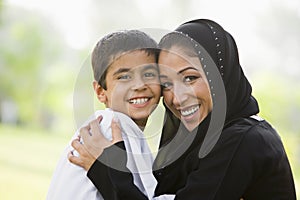 A Middle Eastern woman and her son