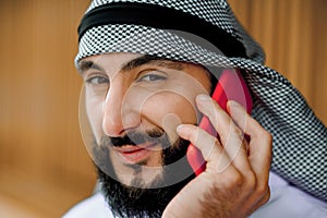 Middle eastern young man talking on the phone