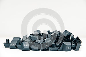 In the middle of a pile of keyboard keys are two keys that form the word 