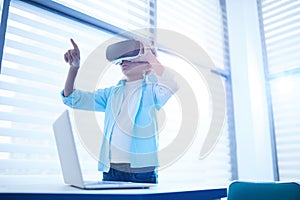 Middle Schooler Using VR Glasses