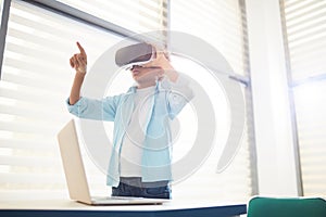 Middle Schooler Using VR Glasses