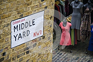 Middle Yard Street sign on a bricked wall in Camden lock market London, UK photo