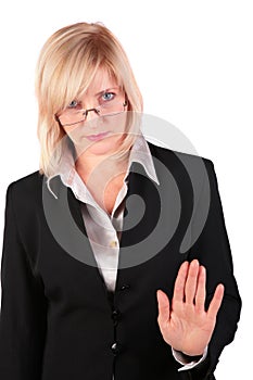 Middleaged businesswoman gives gesture