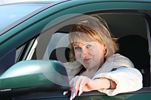 Middleaged woman in car