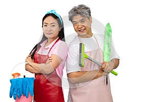 Midle-aged ,young asian couple holding cleaning supplies while standing in studio, isolated on white background,include clipping