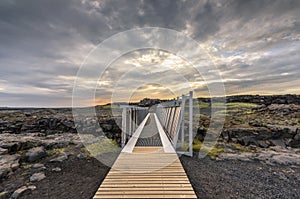 Midlina Bridge bridges the gap between the continental drift of Europe and North America, Sandvic, Reykjanes Peninsula, Iceland