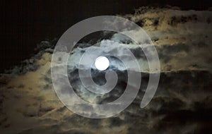 Midnight Moon with billowing clouds