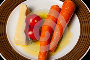 Midnight snack, carrots, tomatoes and cheese, healthy