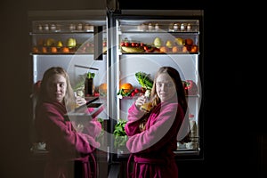 Midnight snack, looking into fridge