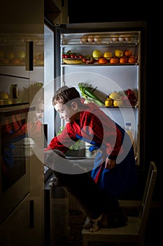 Midnight snack, looking into fridge