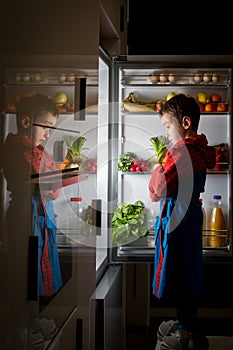 Midnight snack, looking into fridge