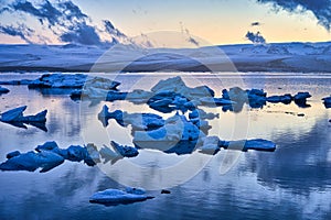 Midnight sun at Jokulsarlon, a large glacial lake in southern part of Vatnajokull National Park, Iceland