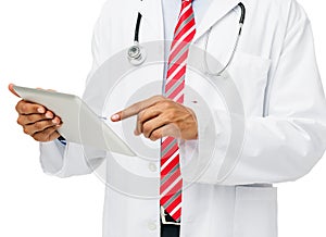 Midsection Of Doctor Using Digital Tablet