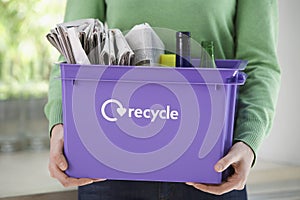 Midsection Woman With Recycling Container