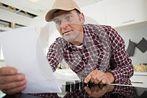 midsection worker during kitchen installation