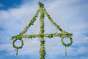 Midsummer maypole, swedish celebration sunny in a park sigtuna