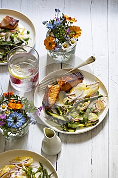 Midsummer meal with salmon and salad