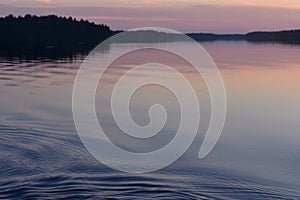 Midsummer sunset reflection on a lake