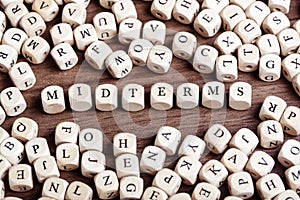 Midterms word on dice letters in chaos table photo