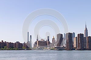 Midtown Manhattan Skyline along the East River in New York City on a Clear Spring Day