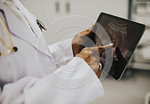 Midwife looking at a sonogram