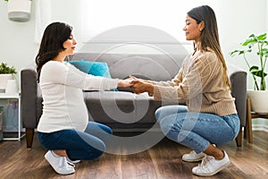 Midwife preparing an expectant mother for labor and childbirth