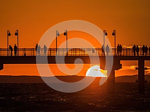 Miedzyzdroje Pier with the sunset sky , Baltic Sea, Poland