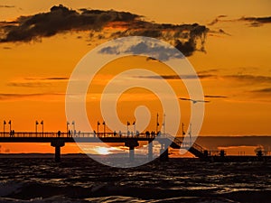 Miedzyzdroje Pier with the sunset sky , Baltic Sea, Poland