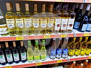 Variety of wines on local supermarket shelf.