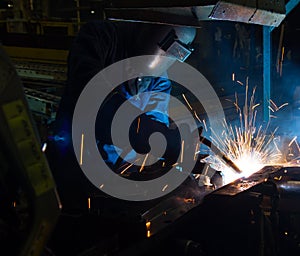 MIG welder uses torch to make sparks during manufacture