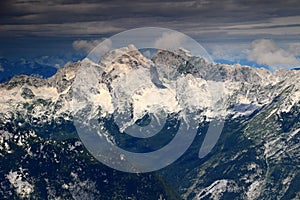 Mighty Jalovec and Mangart peaks and pine forests, Julian Alps