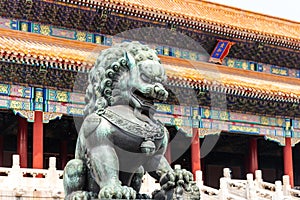 A mighty stone lion in front of the Taihe Hall of the Palace Museum in Beijing