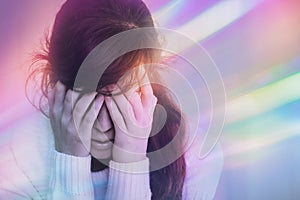 Migraine aura - Portrait of young woman suffering from headache, epilepsy or other problem photo