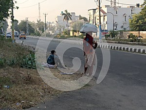 Migrant labours waiting for a ride