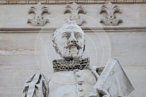 Miguel de Cervantes Saavedra statue. National Library of Spain entrance photo