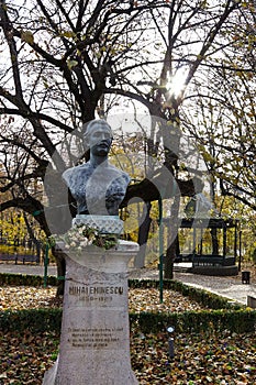 Mihai Eminescus bust statue in Copou Gardens, Iasi, Romania in autumn