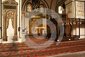 Mihrab and wall in mosque photo