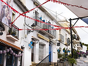 Walking through the streets in Mijas in the Alpujarra Mountains above the costa del Sol photo