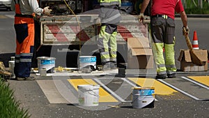 Mikhailovsk, Stavropol region, Russia - April 25 2022: road works. painting of a pedestrian crossing. Road repair