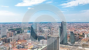 Milan aerial view of modern towers and skyscrapers and the Garibaldi railway station in the business district timelapse