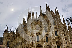 Milan Cathedral building against cloudy sky Italy