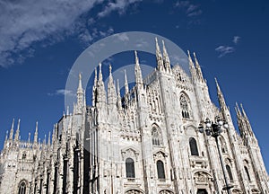 Milan Cathedral with its golden Madonnina.